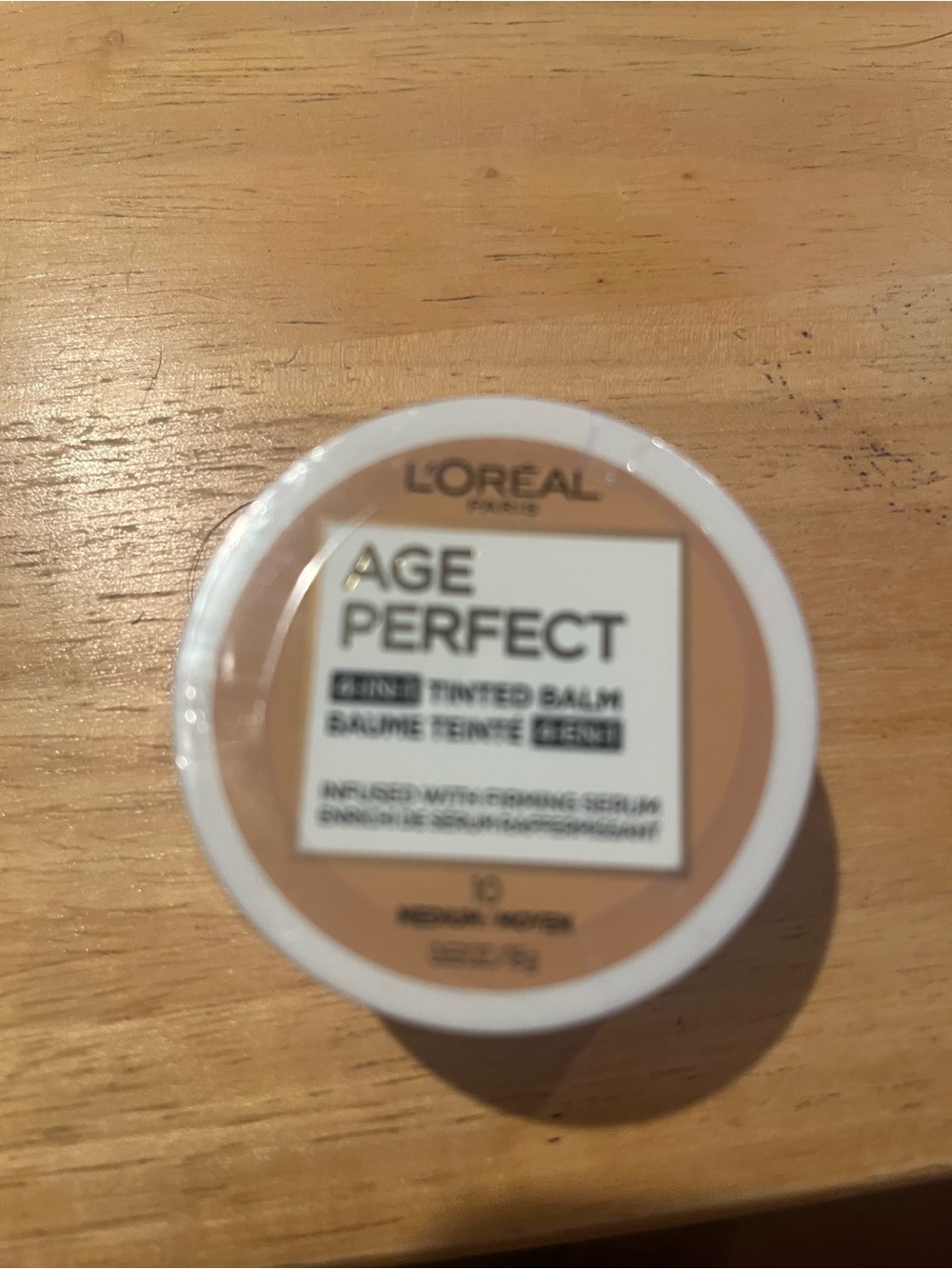 L'Oreal Age Perfect Tinted Balm in beige/white packaging